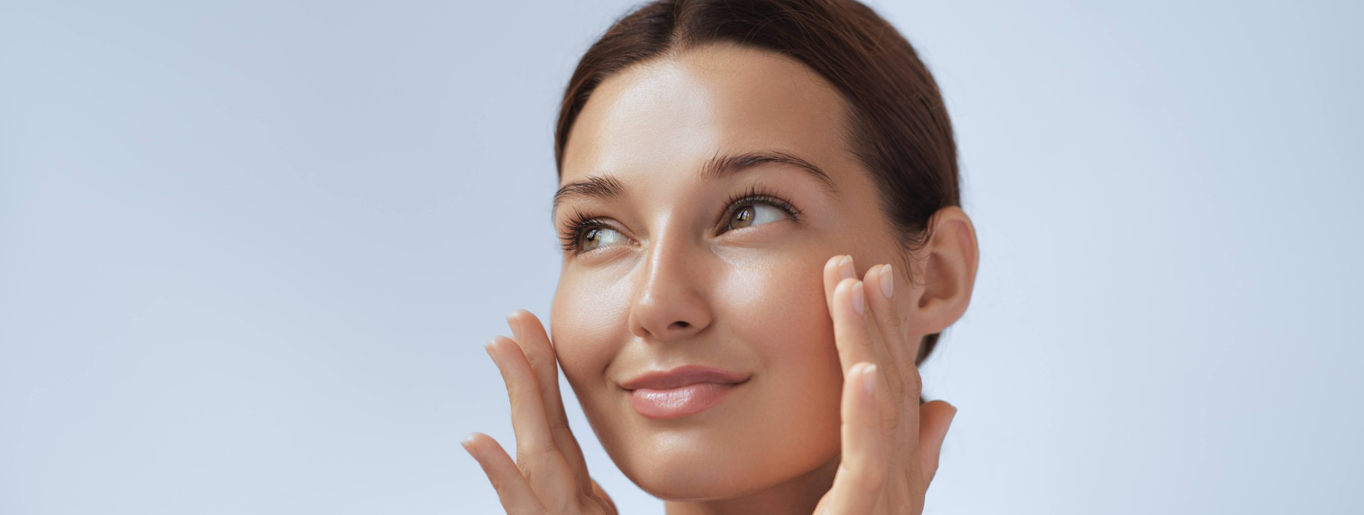 Woman touching face